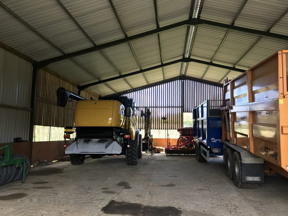 Tractor inside a large shed